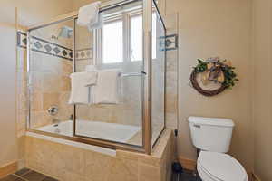 Full bathroom featuring tiled shower / bath combo