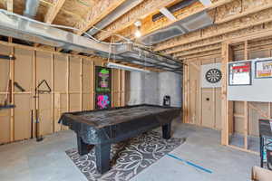 Rec room with concrete flooring and pool table