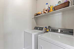 Laundry room featuring washer and dryer