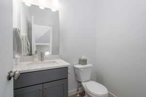 Bathroom with vanity and wood finished floors