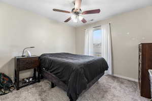 Bedroom with carpet floors and ceiling fan