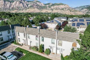 View of mountain backdrop with nearby suburban area