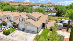 Aerial view of residential area featuring a mountain backdrop