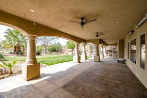 View of patio featuring a ceiling fan