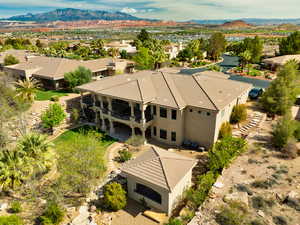 Aerial view of residential area featuring a mountainous background