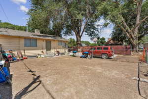 View of yard with entry steps