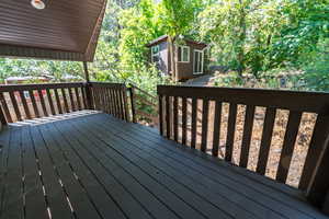 Deck featuring an outdoor structure