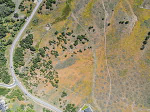 Aerial view of property and surrounding area with rural landscape