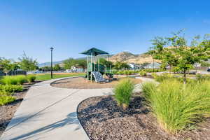 Community jungle gym with mountain views.