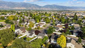 Aerial view of residential area with a mountainous background