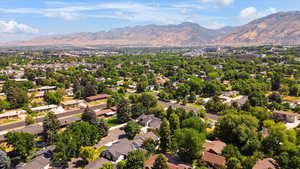 Aerial view of residential area with a mountain backdrop