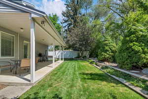 View of yard with a patio