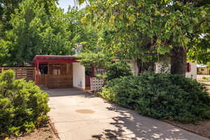 Carport and entrance to backyard