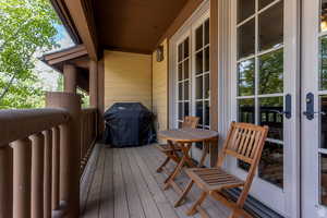 Balcony with french doors and area for grilling