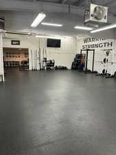 Garage featuring a heating unit