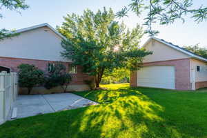 View of yard with a patio