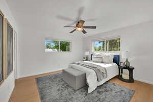 Bedroom featuring light wood-type flooring and a ceiling fan