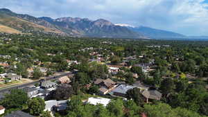 Aerial view of residential area with a mountainous background