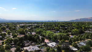 Aerial view of property's location with a mountainous background