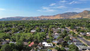 Aerial view of property's location featuring nearby suburban area