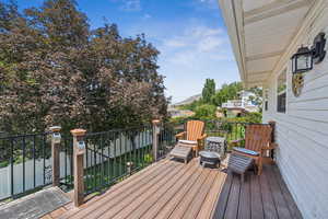 Deck off Dining area w/stairs down to backyard