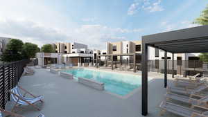 Community pool with a patio area