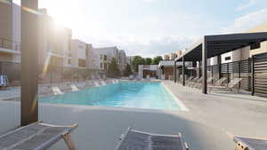 Community pool with a patio area