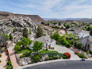 Aerial view of residential area featuring mountains