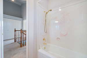 Full bathroom with shower / bathtub combination