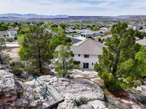 Aerial view of residential area with mountains