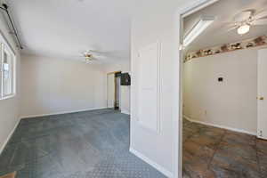 Unfurnished room with a ceiling fan