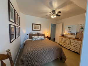 Bedroom featuring baseboards and a ceiling fan
