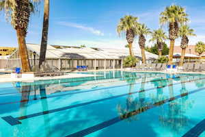 Community pool featuring a patio area