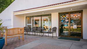 View of exterior entry featuring stucco siding