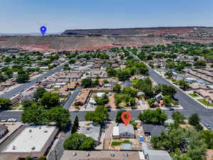 Aerial perspective of suburban area with mountains