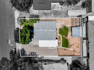 Aerial view of property and surrounding area with property boundaries highlighted