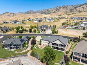 Aerial view of residential area with a mountainous background
