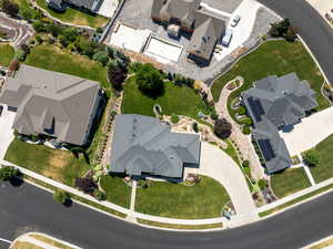 Aerial view of property's location with nearby suburban area