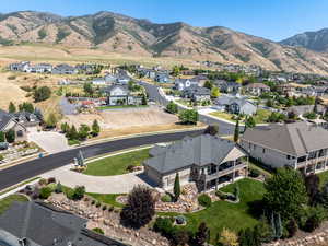 Aerial view of residential area with a mountainous background