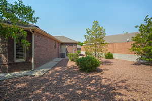 View of yard with a patio