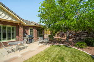 View of yard with a patio area