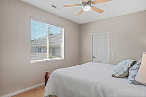Bedroom featuring carpet flooring and a ceiling fan