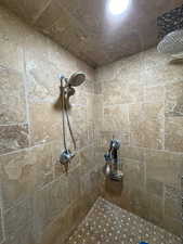 Bathroom view of a tile shower