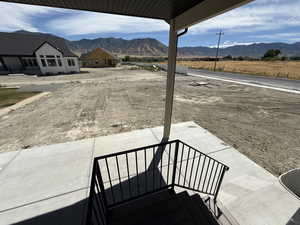 View of patio with a mountain view