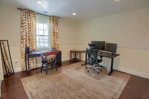 Office featuring wood finished floors and recessed lighting
