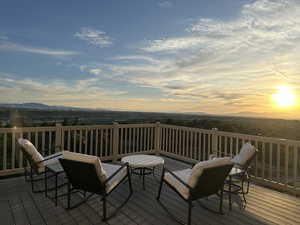 Deck at dusk with a mountain view