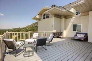 Deck featuring outdoor lounge area
