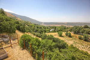 View of mountain background featuring rural landscape