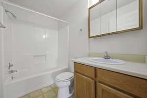 Full bath with bathing tub / shower combination and vanity