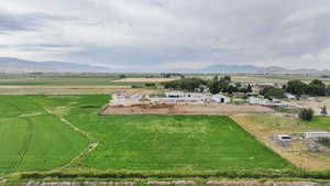 Aerial view of sparsely populated area with a mountainous background